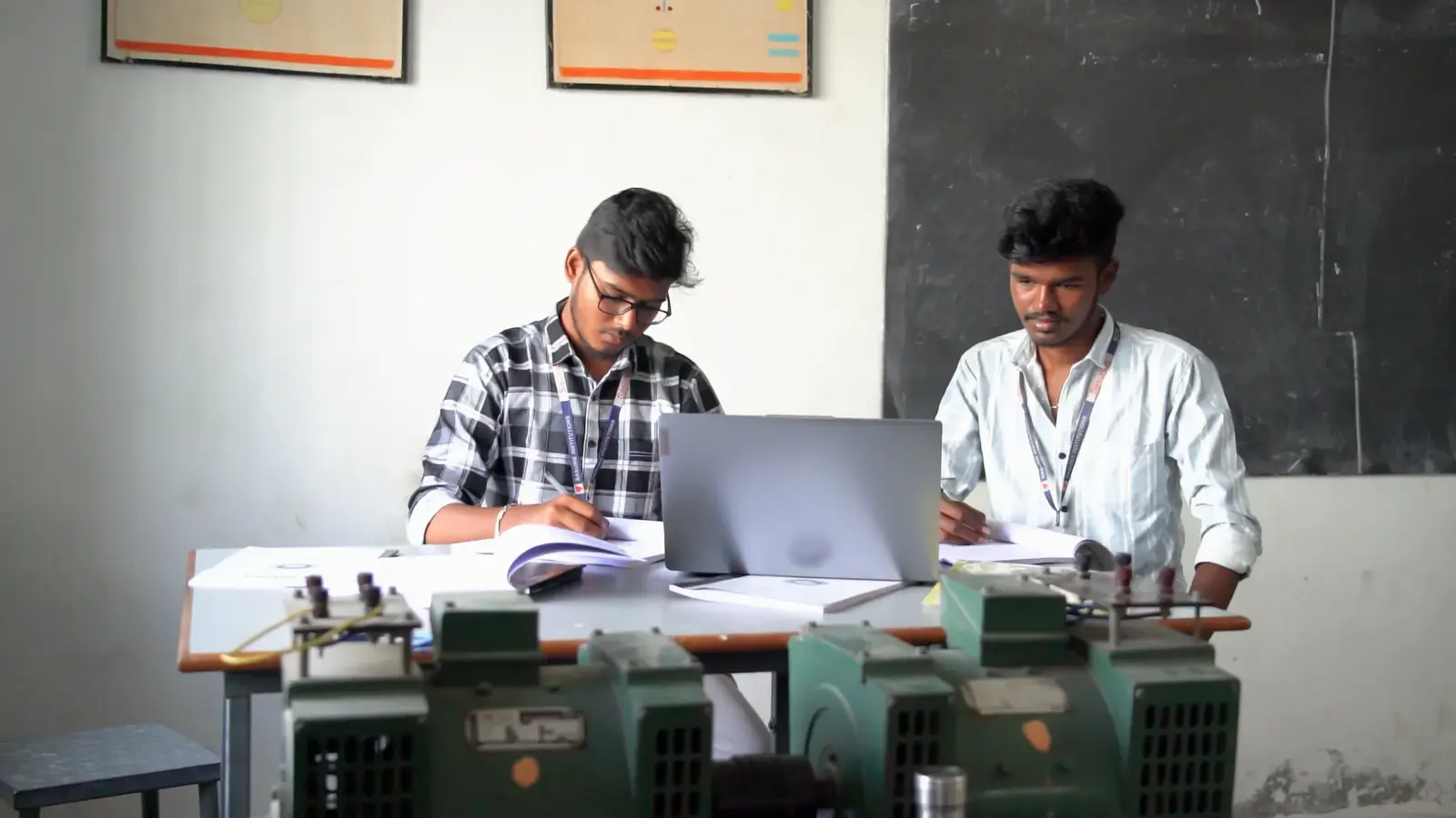 A student and a faculty member in a laboratory