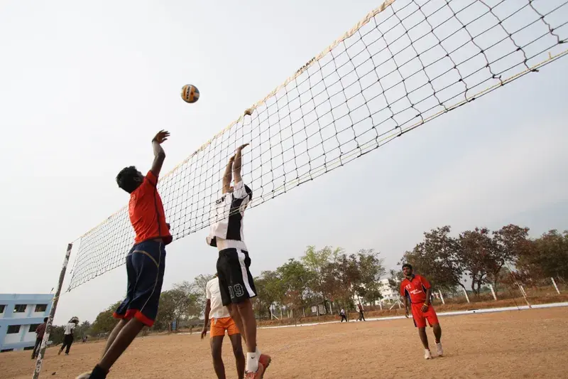 Volleyball players at the net
